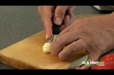 Italian Recipes - Cutting the Garlic for Papa al Pomodoro