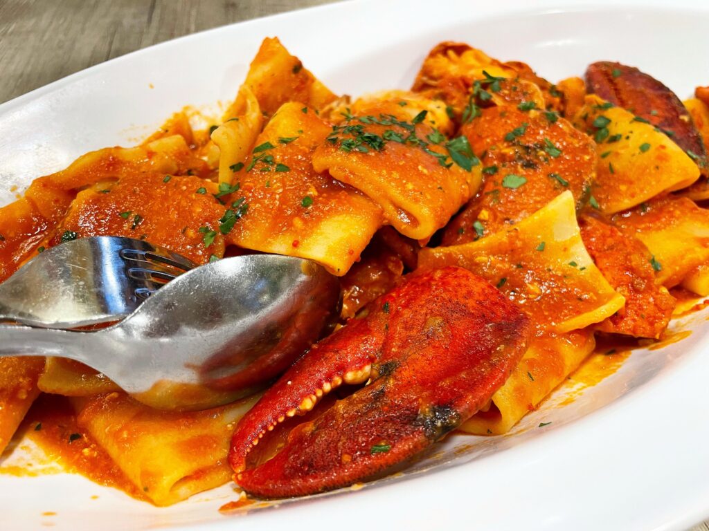 Paccheri con Aragosta (Paccheri pasta with Lobster) at Ristorante “Da Vito” in Senori, Sardinia 🦞