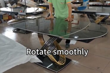 Oval extendable swivel dining table