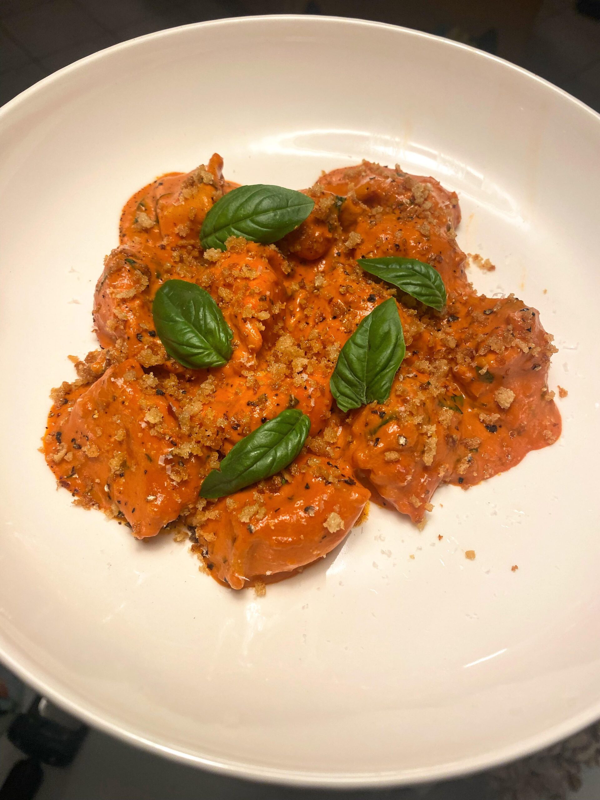 Cheese agnolotti in a spicy vodka cream sauce Cheese agnolotti in a spicy vodka cream sauce