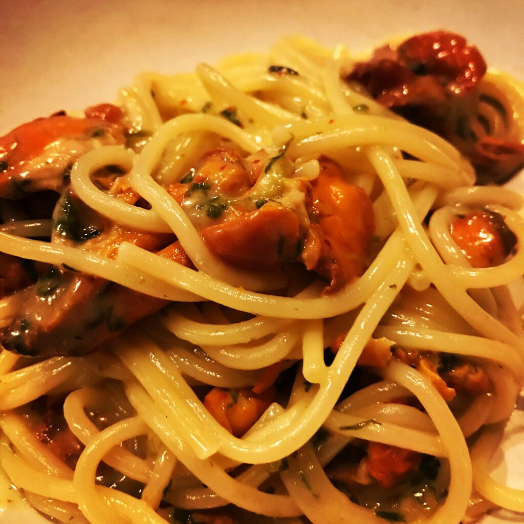 Spaghetti with chanterelles, thyme, butter, and Parmigiano