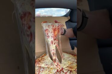 Eating Nonna’s pizza and doing a cheese pull test!