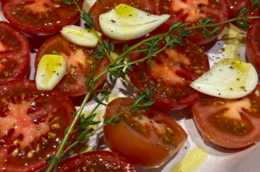 Making late night pasta with roasted tomatoes, pancetta and white wine.