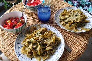 Homemade pappardelle and basil pesto with a salad of home-grown tomatoes