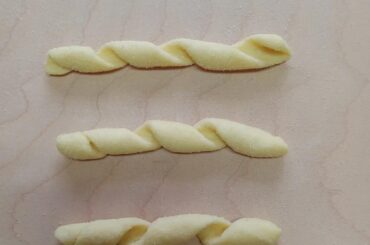 Busiate with brown almond sauce