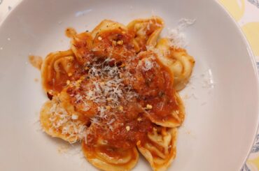 Store bought tortellini with tomato sauce made with fresh tomatoes from the garden