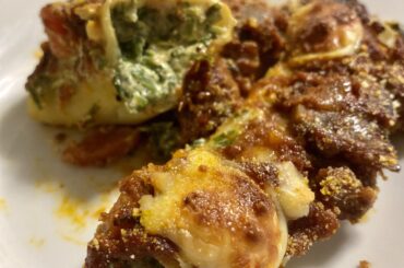 My homemade spinach and ricotta cannelloni. Three meat sauce.