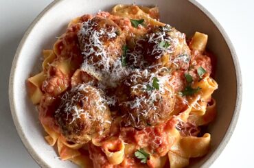 Fresh all yolk tagliatelle with a pomodoro cream sauce and chorizo meatballs