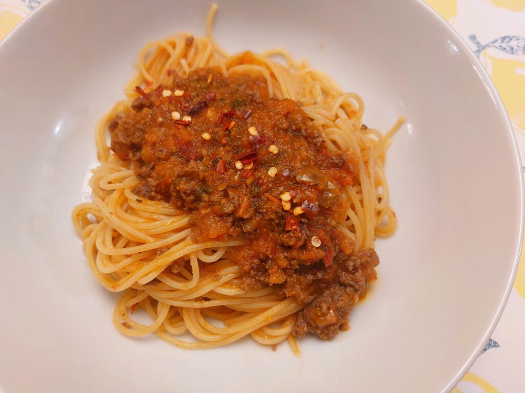 Spaghettini with garden tomatoes meat sauce