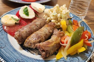 Fried sweet sausage peppers and onion