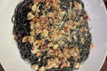 Lobster and Portobello Mushrooms with scratch made squid ink spaghetti with a cream sauce