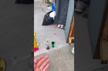 Bottle Of Wine Outside Homeless Encampment