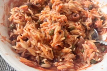 Risoni with Capers and Olives with parmsan cheese and a bit of salt and pepper for flavour