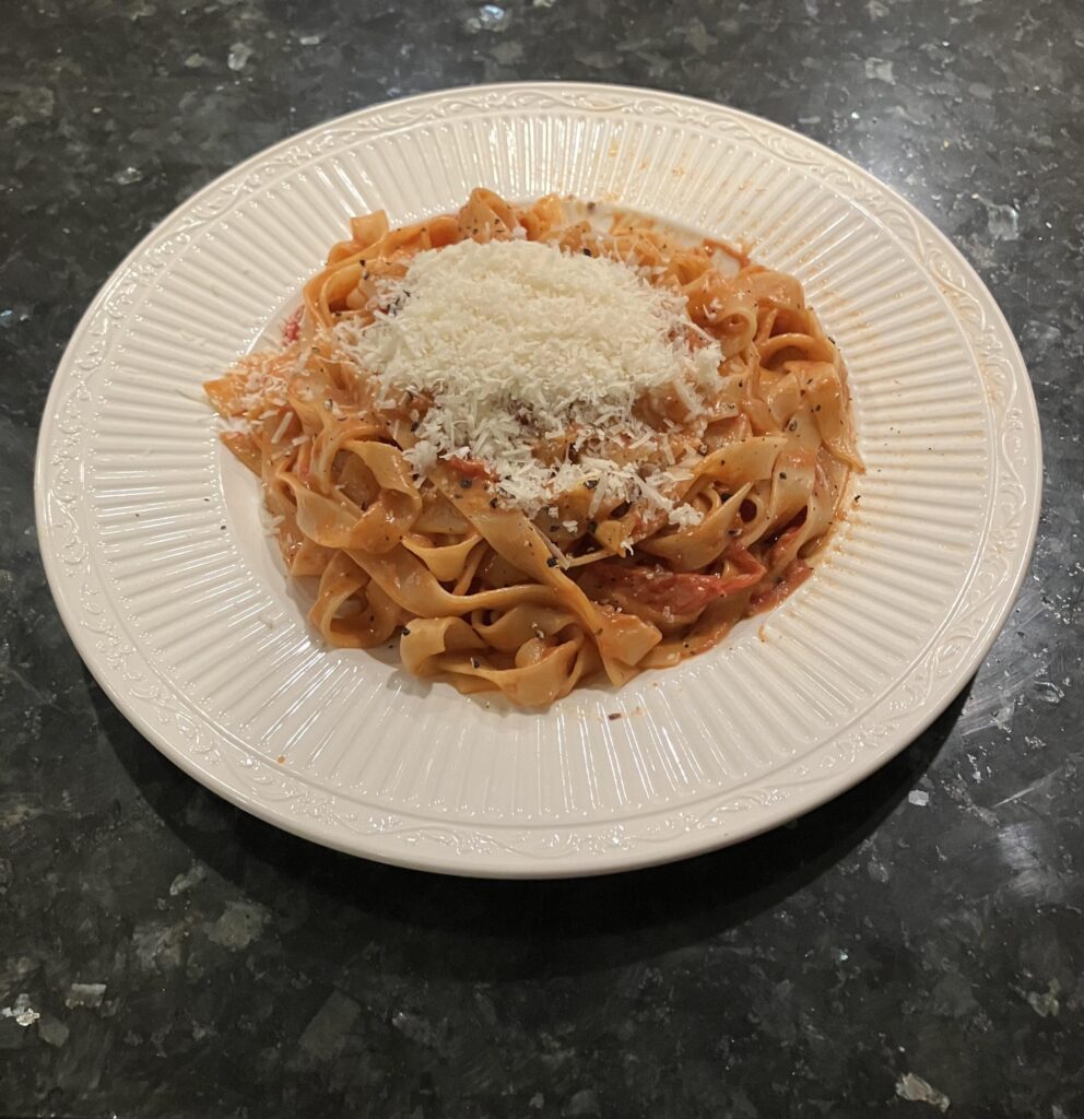 Tagliatelle with a homemade cherry tomato cream sauce.