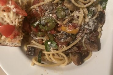Pasta with a spicy tomato sauce and mushrooms