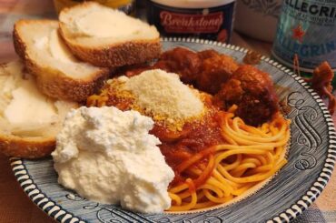 Spaghetti and meatballs with extra ricotta cheese and extra parmegianno regiano