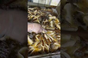 Here's how they make up to 8,000 homemade #cannolis daily at Fortunato Brothers. #italian #pastries