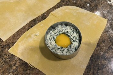 Spinach ricotta and egg in a big ravioli. Could have probably used something with a crunch like pine nuts.