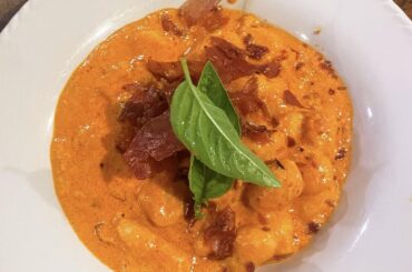 Gnocchi with vodka sauce and crispy prosciutto