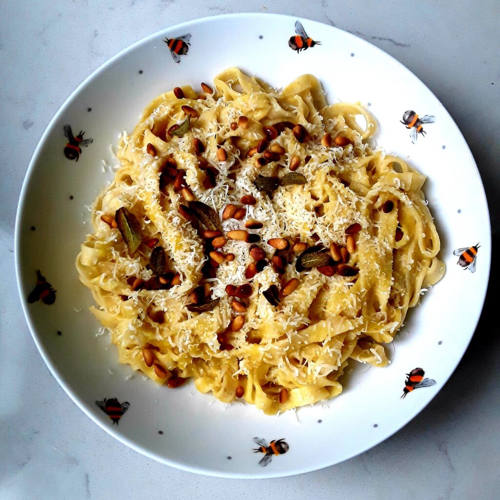 Pumpkin and amaretti tagliatelle with toasted pine nuts, parmesan and sage