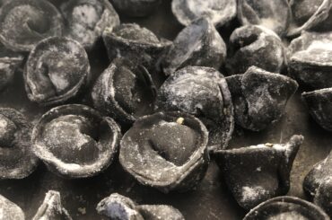 squid ink pasta + ricotta cappelletti