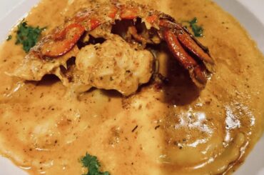 Homemade lobster ravioli w/ lobster and tomato cream sauce