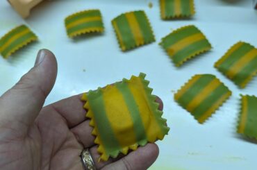 Roasted butternut squash and cheese filled multi colored pasta