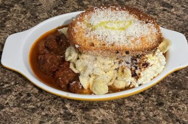 orecchiette pasta with Italian sausage and shiitake red sauce, ricotta, and parmigiana reggiano