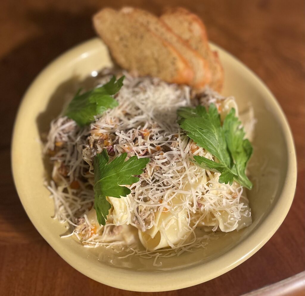 buddy killed a deer recently. got a little bit of venison from him. venison white bolognese, pappardelle, parm, celery leaves