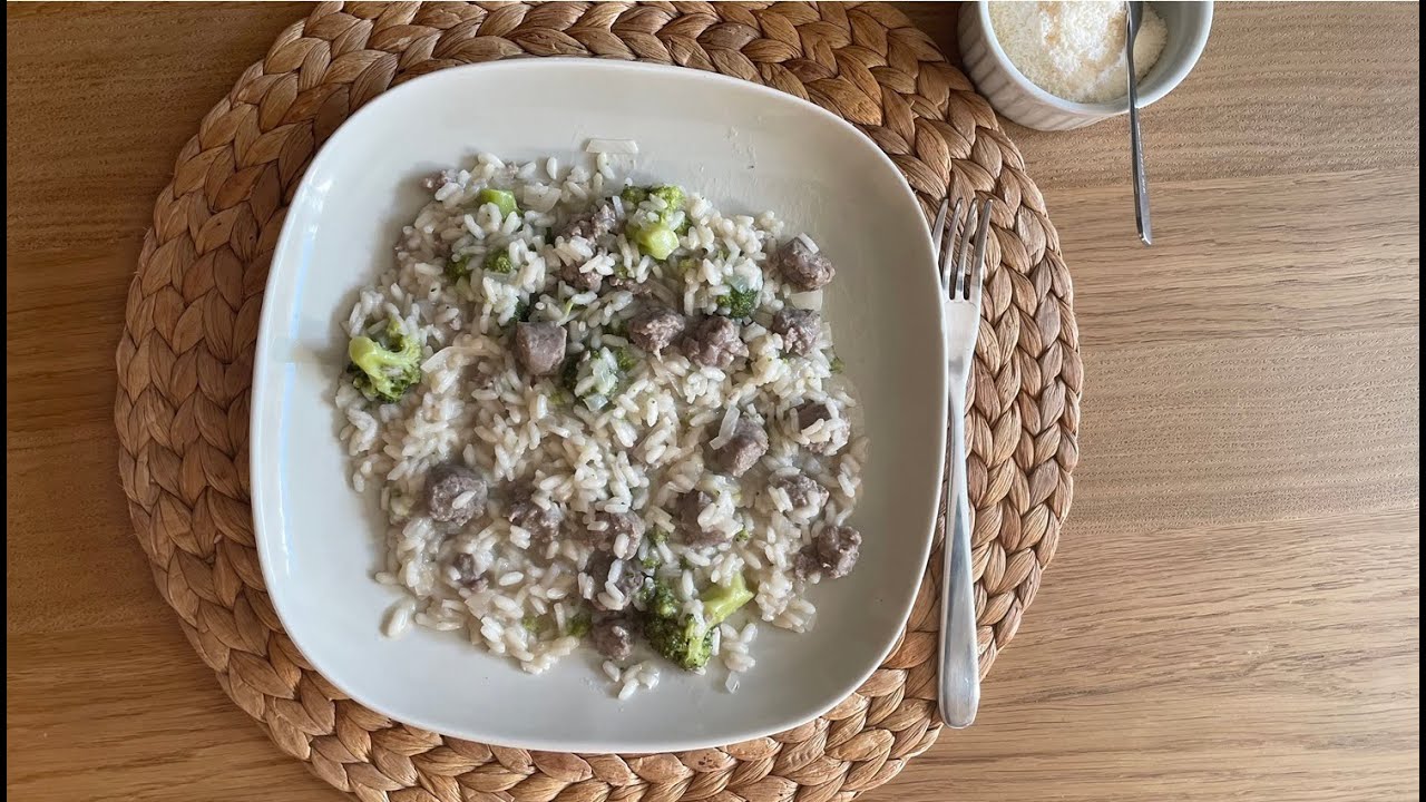 Italian Rice with sausage and broccoli. (Risotto Salsiccia and broccoli.) Italian Rice with sausage and broccoli. (Risotto Salsiccia and broccoli.)