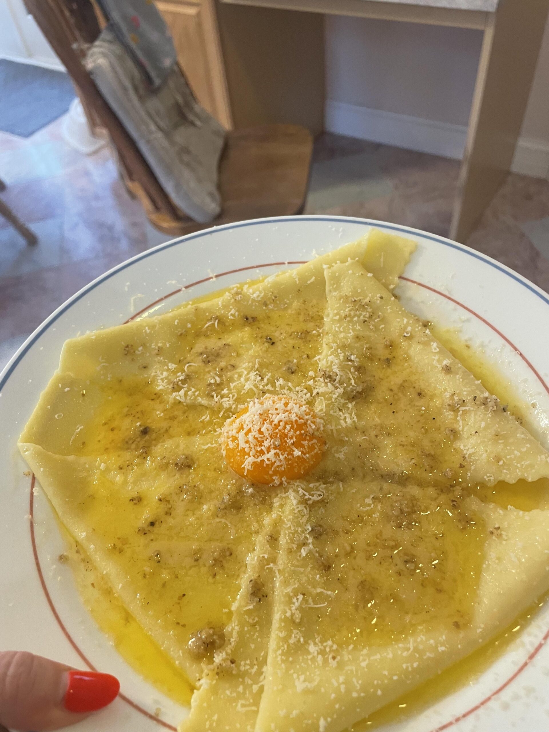Fresh silk handkerchief pasta in beurre blanc with confit egg yolk and walnuts Fresh silk handkerchief pasta in beurre blanc with confit egg yolk and walnuts
