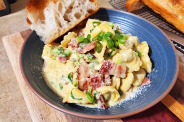 Beef tortellini in bacon cream sauce with green onions