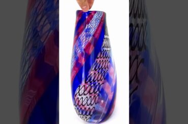 Artist In Italy Making a Murano Glass Flower Vase.