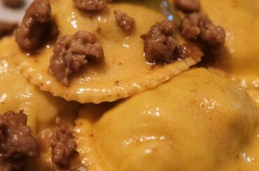 Italian sausage, apple, parmesan ravioli in a brown butter sage sauce