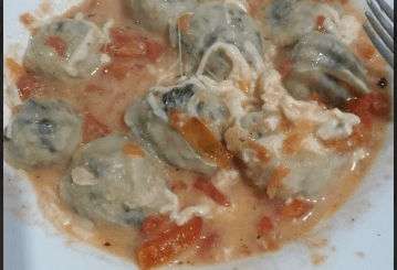spinach and cheese panzotis, with red and cream sauce. especially for days that are very cold!