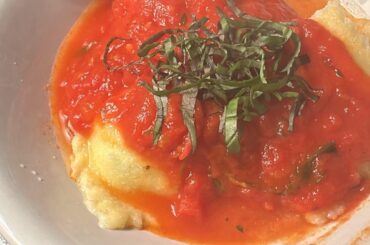 Spinach and ricotta ravioli in pomodoro