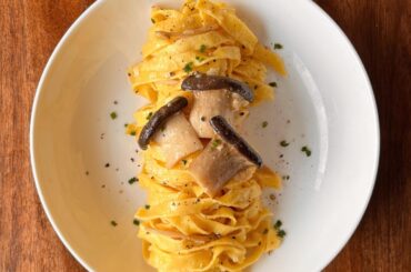 homemade pasta, butter and parmesan sauce with king oyster mushrooms