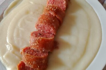 Cotechino with smash potatoes, it may not look tasty but I hope my mom like it, should I add something on it?