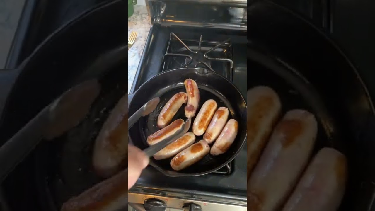 Cooking Sausages in a Cast Iron Pan Cooking Sausages in a Cast Iron Pan