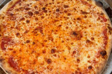 How long before launching do you guys take your cold fermented dough out the fridge?