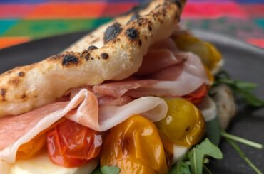 Panuozzo. Not exactly pizza but it's the same dough and was baked in the same way as Neapolitan pizza.