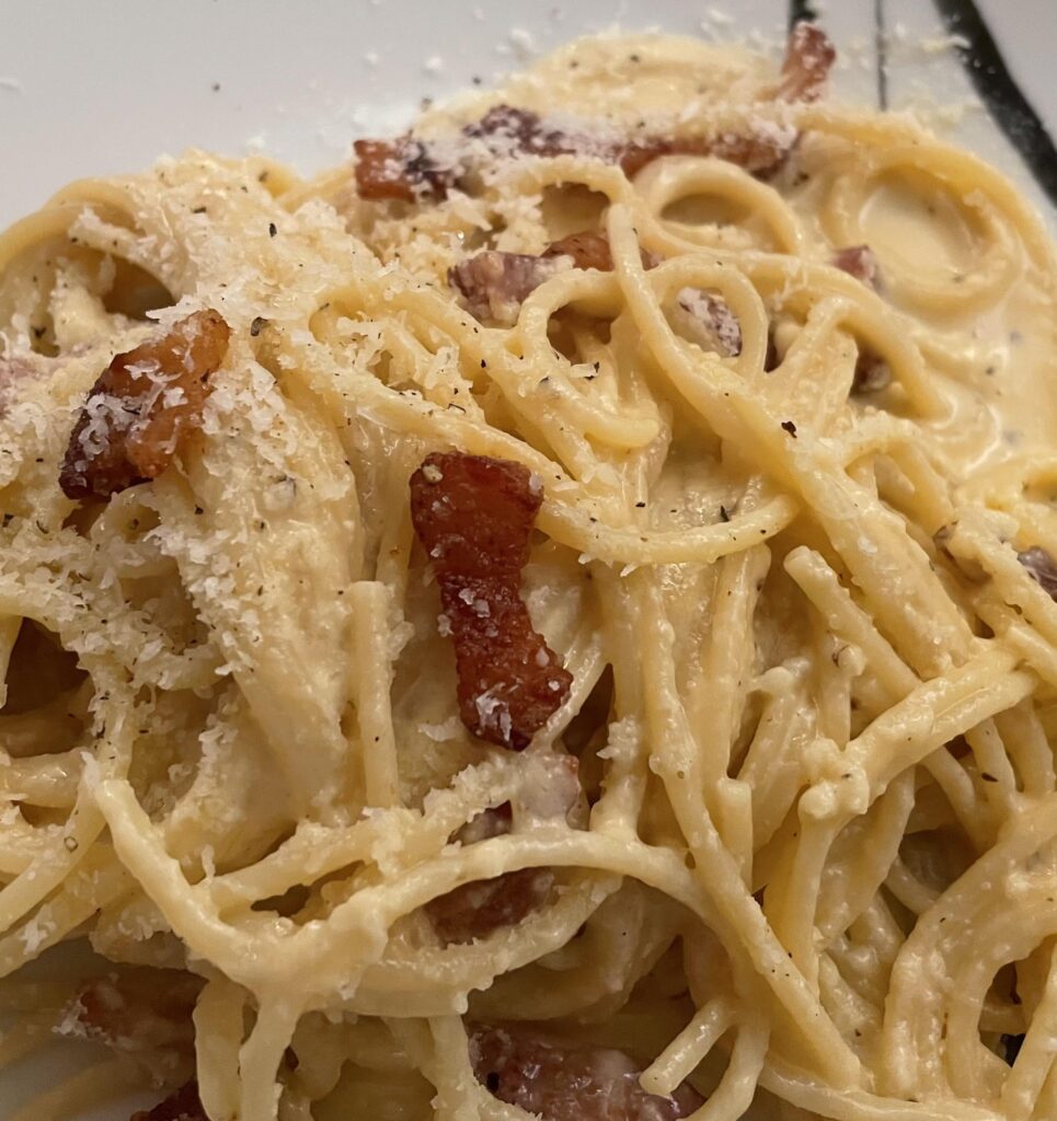Carbonara with Guanciale and Pecorino. "Al dente", with whole egg as I don't throw out anything