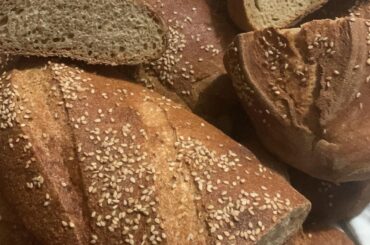 [homemade] Sourdough bread with “own production” farina di crusca (bran flour) on the left and farina di semola (semolina flour) on the right baked on wood-fired dual chamber stone oven.