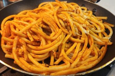 Bucatinni with melted mozzarella, clam sauce and ricotta salat cheese with Brooklyn baked italian bread mangia