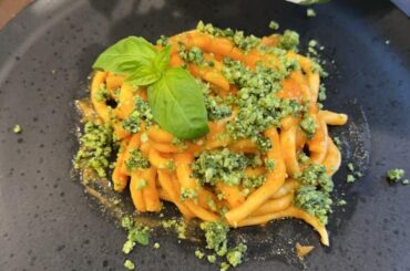 Homemade bucatini with a basil/parm crumble