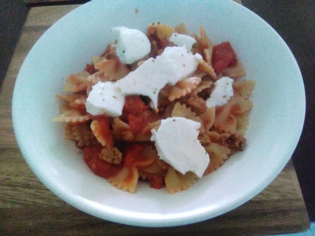 Italian Farfalle Pasta With Chopped Tomatoes And Quorn Mince Topped With Italian Mozzarella