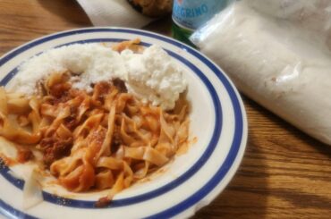 Homemade pasta with ricotta and grated parmegianno with an aperol for dessert