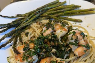 Shrimp scampi over linguine