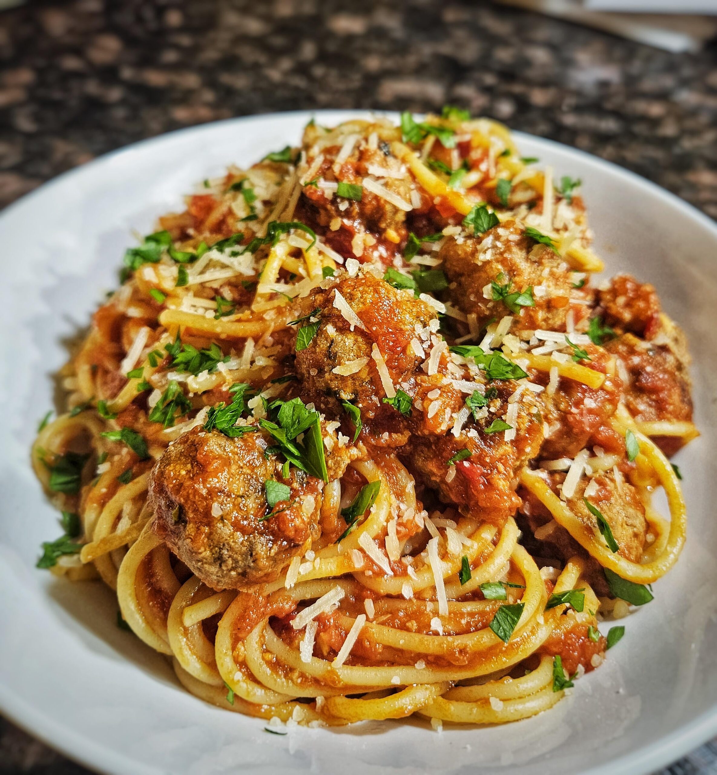 Spaghetti and mini meatballs. Spaghetti and mini meatballs.
