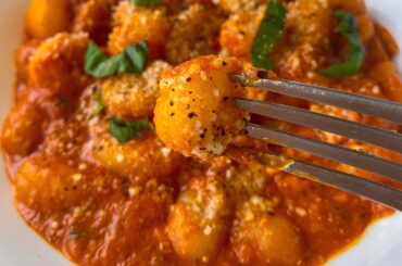 Gnocchi with Shrimps, Red Sauce and Basil.